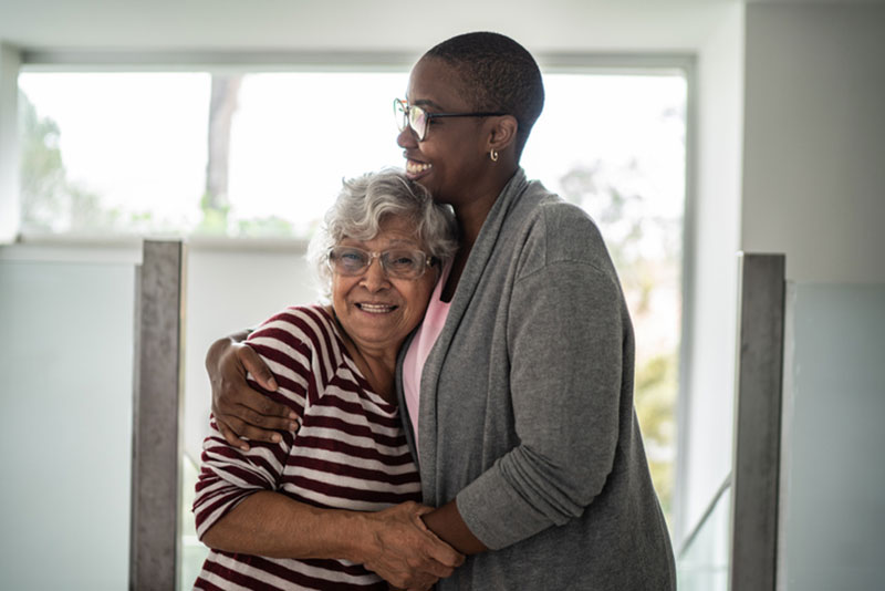 A woman uses anxiety management tips to help her aging mother.